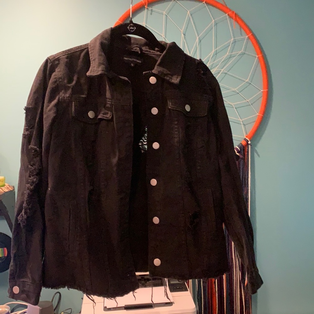 Distressed black denim jacket